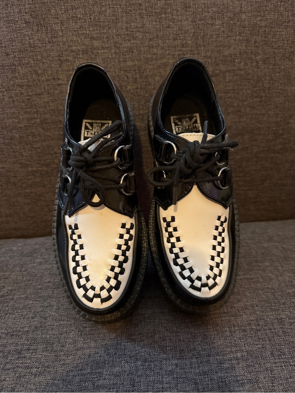 T.U.K.’s Black and White Woven Toe Lace-Up Shoes